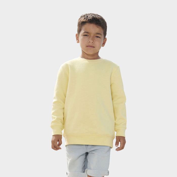 Model wearing a branded kids round-neck sweatshirt