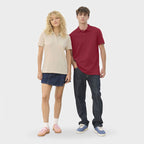 Model wearing a branded stretch fit men's polo shirt