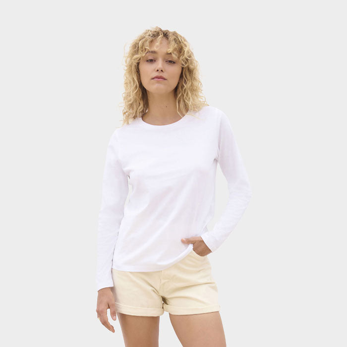 Model wearing a branded long sleeve women's t-shirt