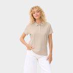 Model wearing a branded women's polo shirt