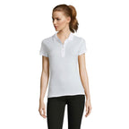 White four button women's polo shirt, front view