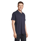 Navy branded polo shirt, side view