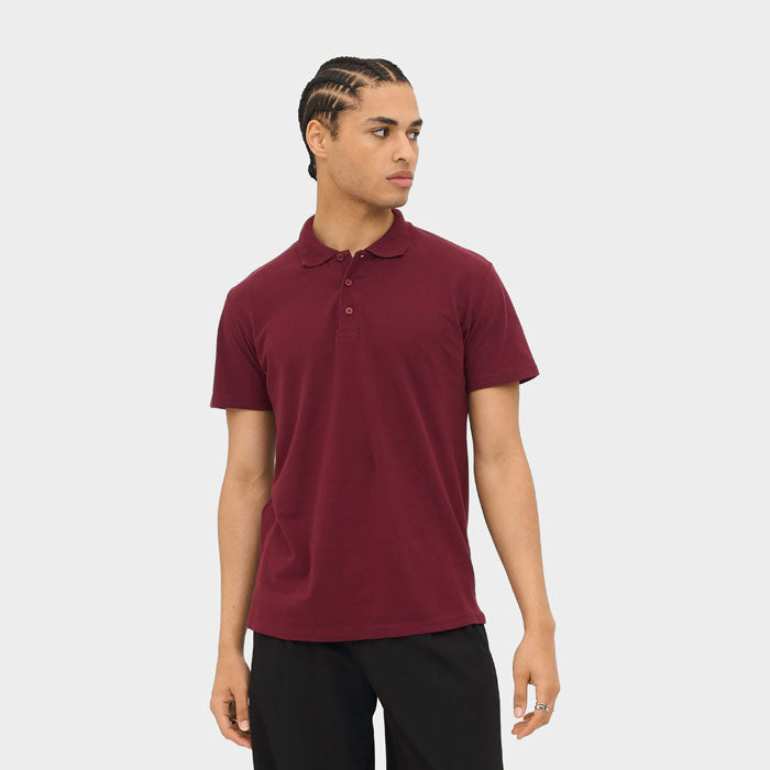 Model wearing a branded lightweight men's polo shirt