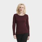 Model wearing a branded fitted long sleeve women's t-shirt