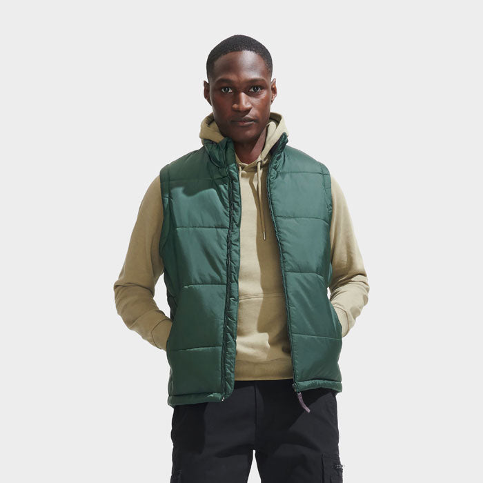 Model wearing a branded quilted bodywarmer