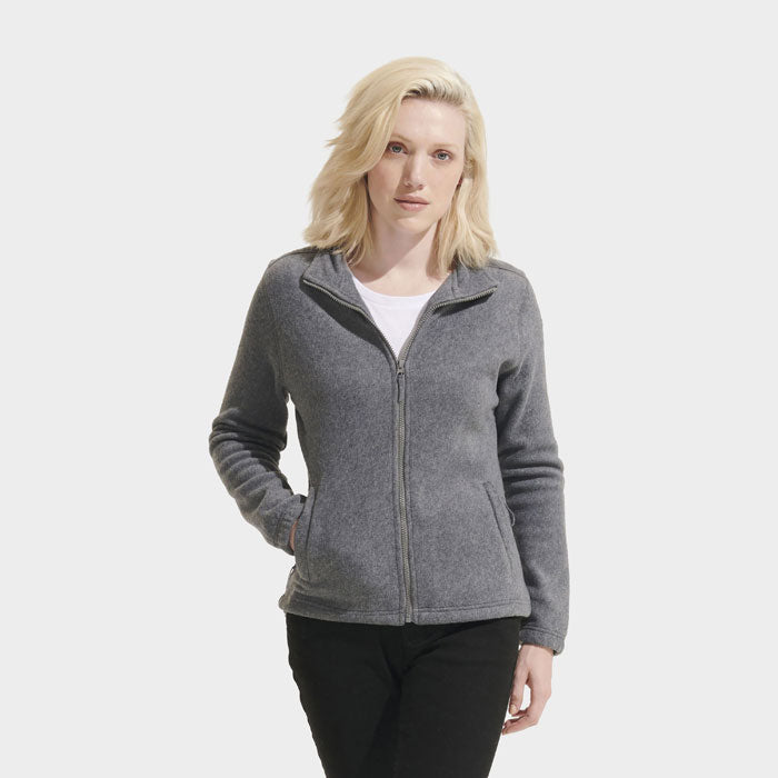 Model wearing a branded women's zipped fleece jacket
